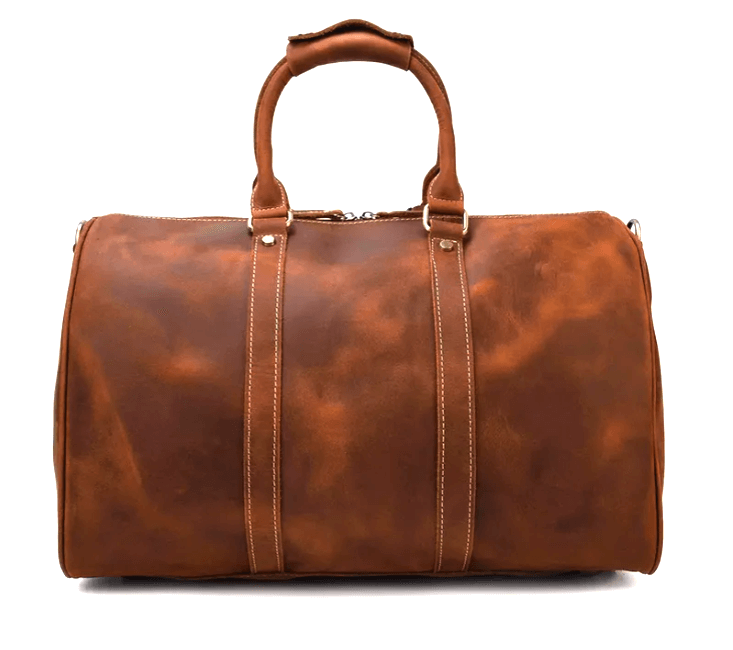 Stylish leather duffle bag in rich brown color, perfect for travel and outdoor adventures.