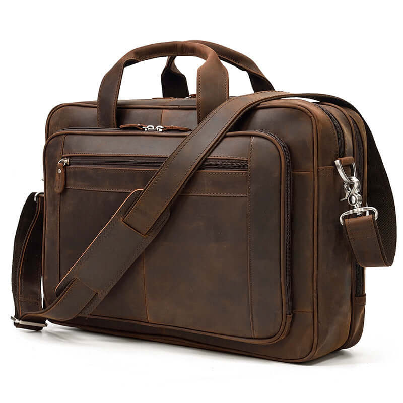 Travel Messenger Bag Santorini in brown leather, featuring dual handles and shoulder strap for versatile carrying.
